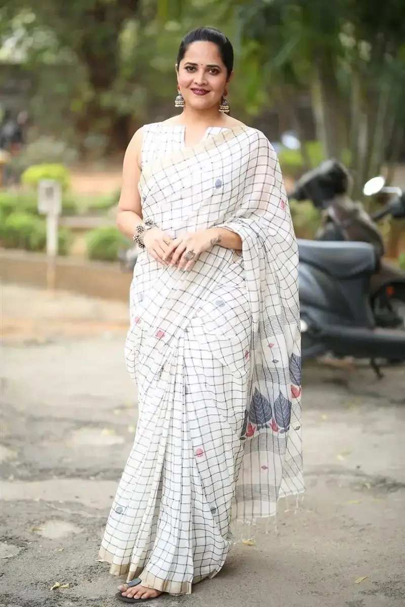 Anasuya Bharadwaj in White Saree at Razakar Movie Launch